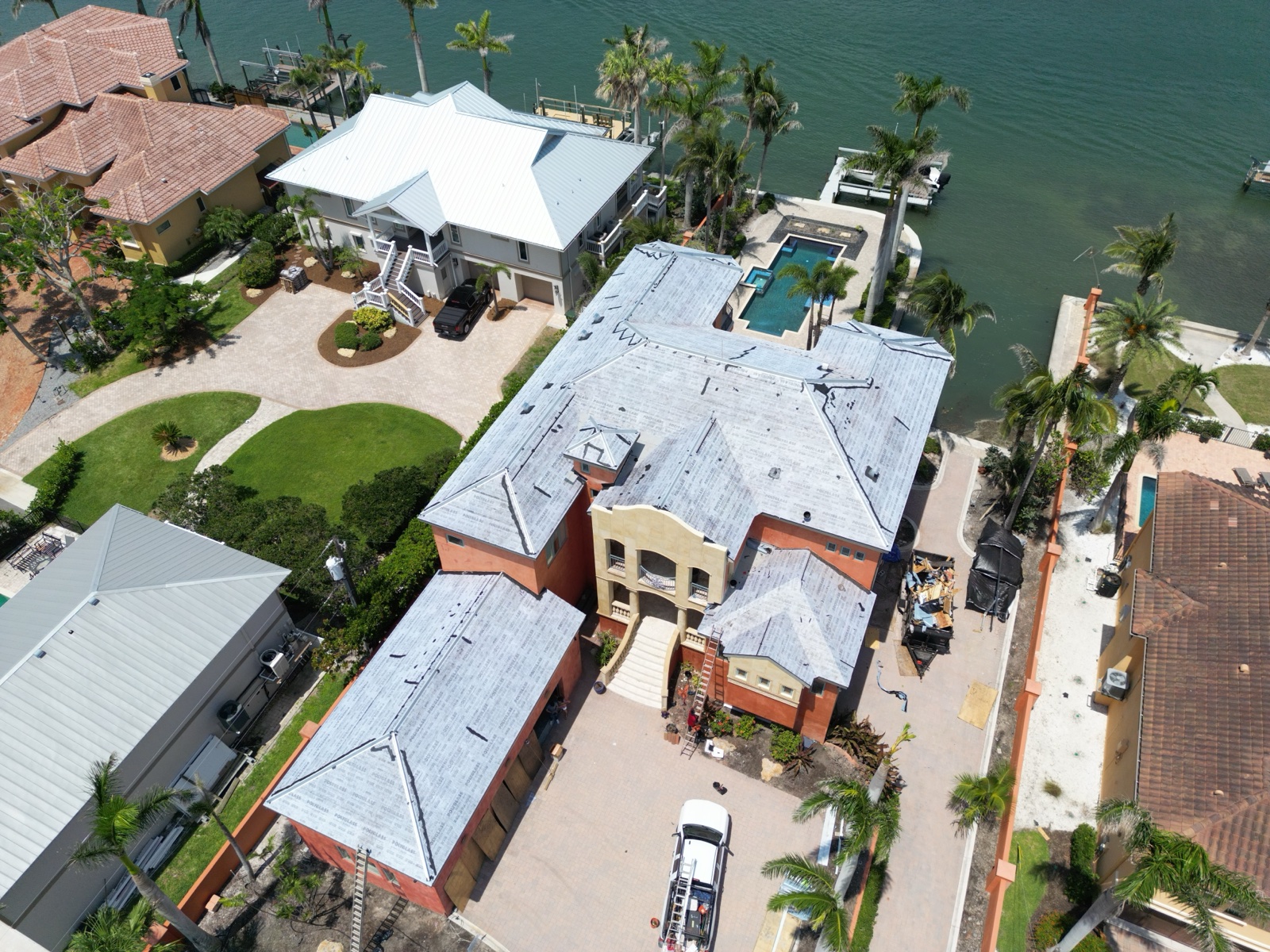 Roof tear-off and underlayment on a large waterfront home